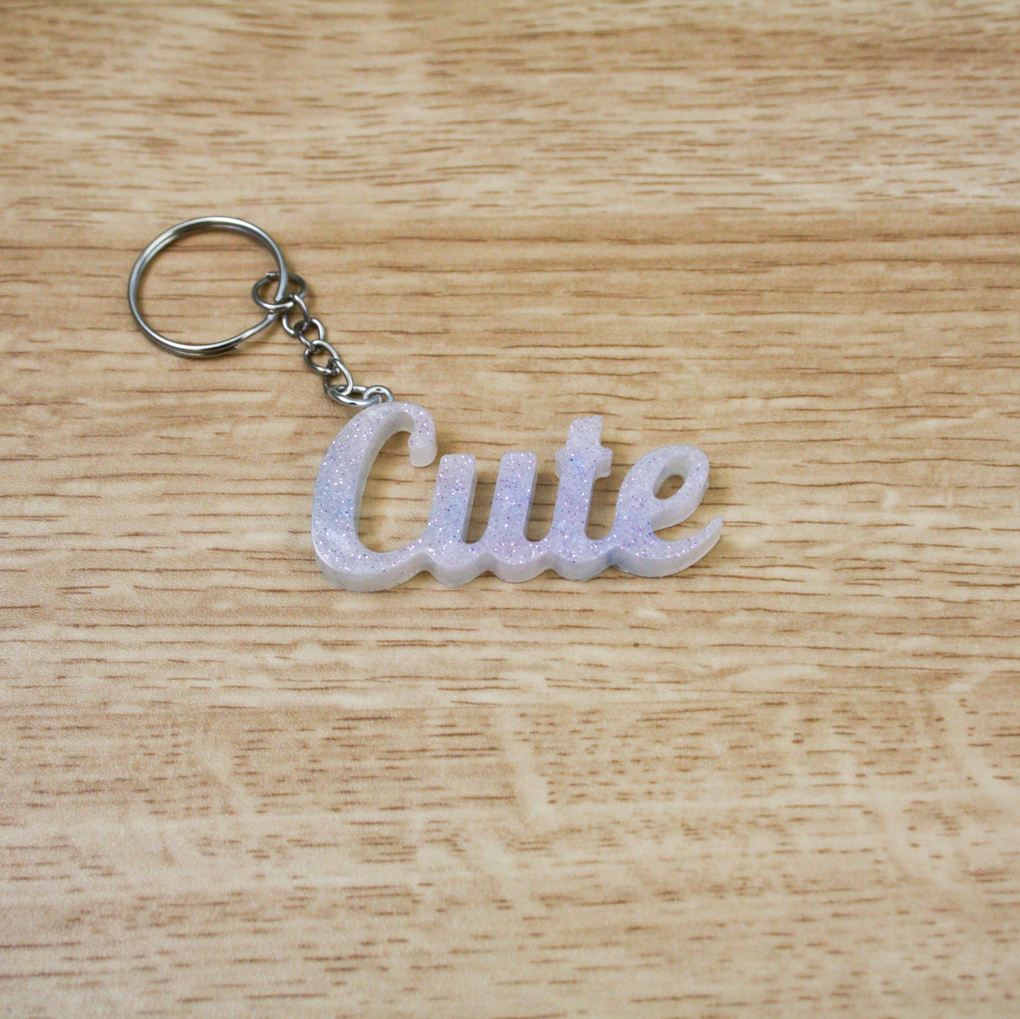 Porte clés "cute" rose pale paillettes