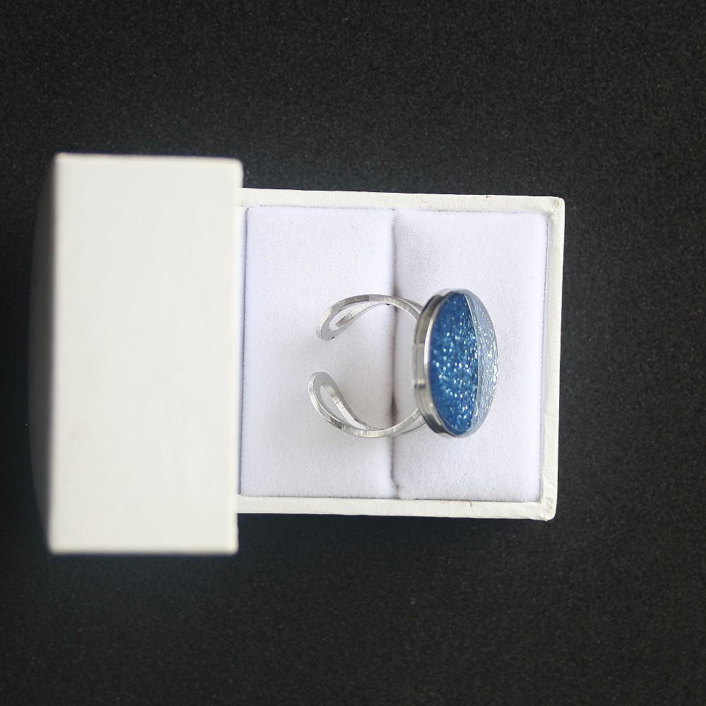 Bague fond bleu pailleté