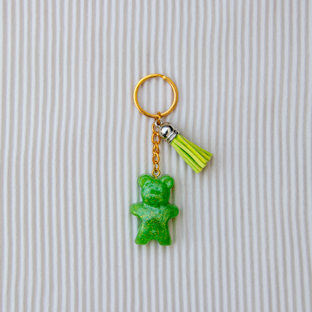 Porte clés petit ourson vert paillettes