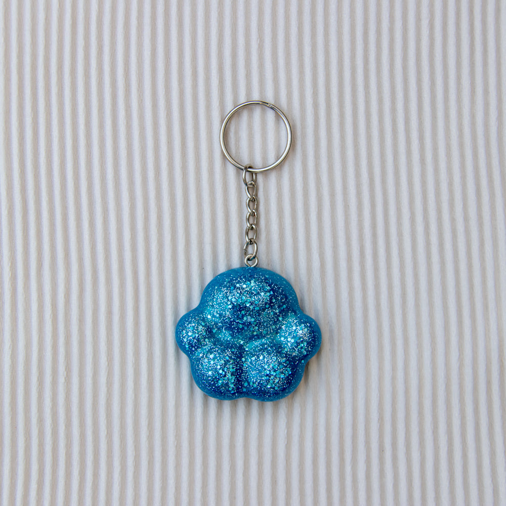 Porte clés patounette bleu paillettes