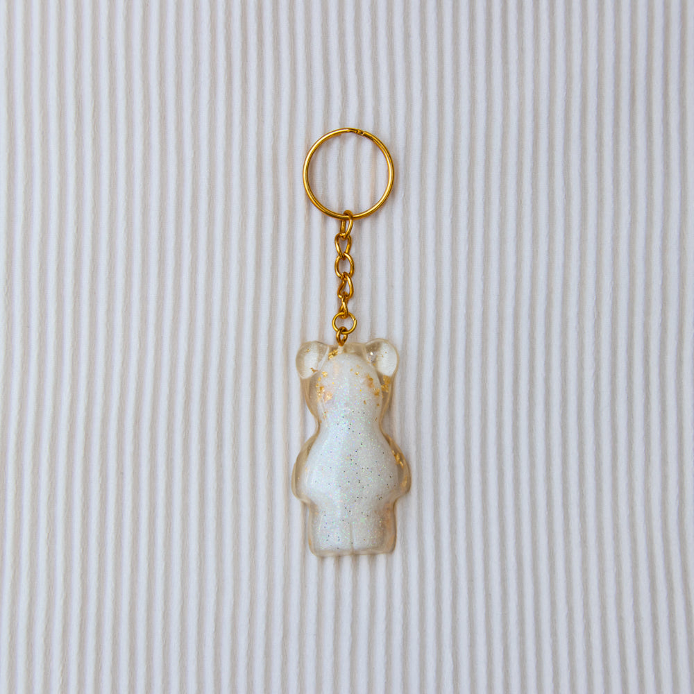 Porte clés ourson blanc paillettes