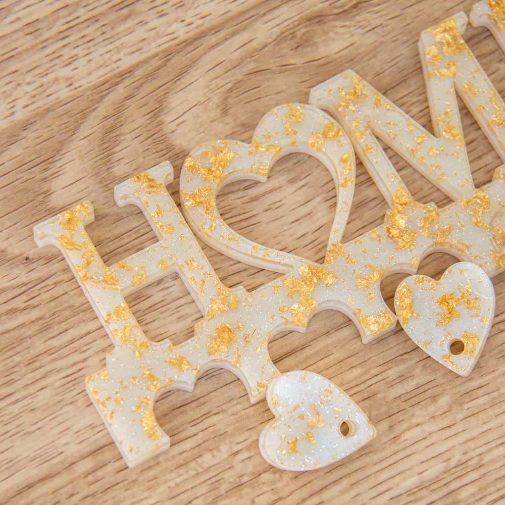 Porte-clés mural blanc et feuilles d' or