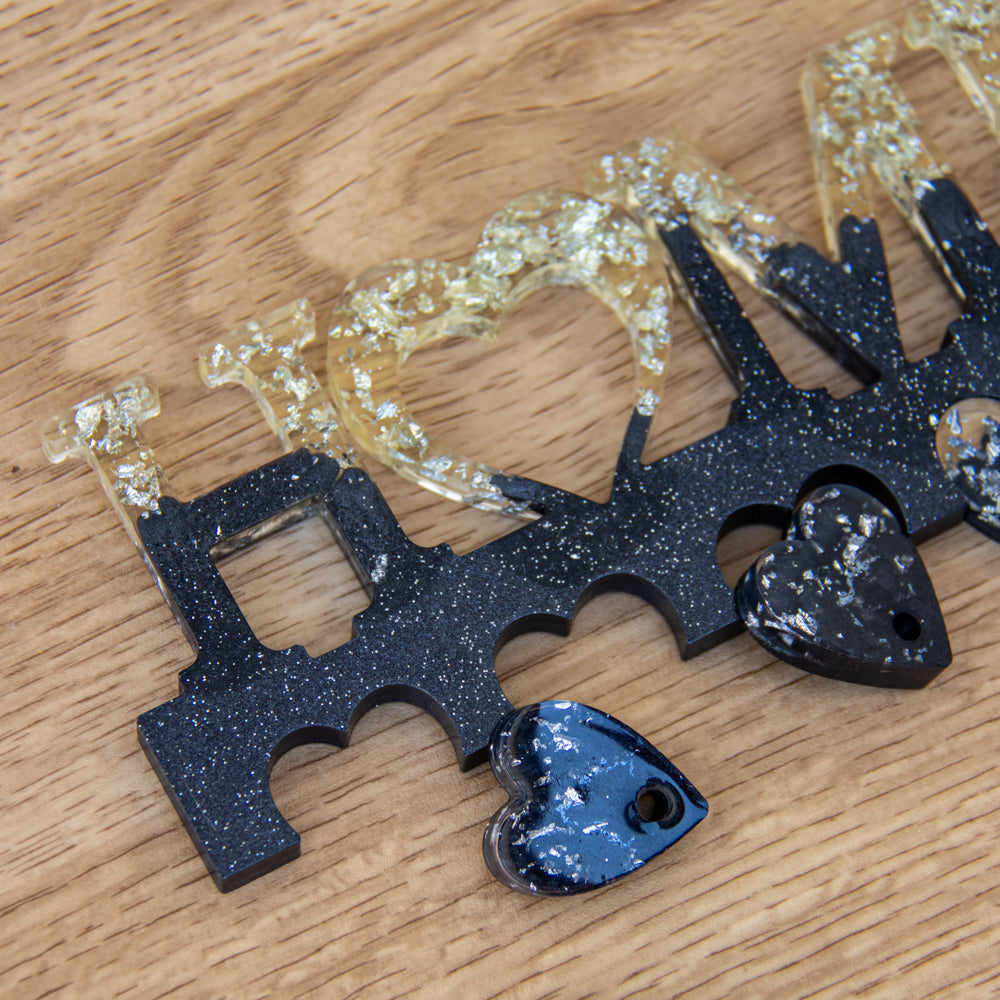 Porte-clés mural noir et or