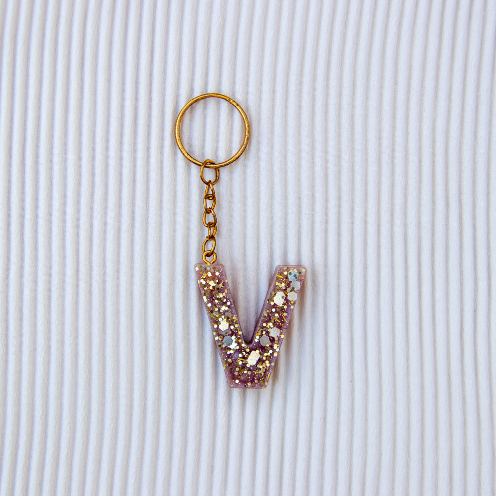 Porte-clés lettre V mauve paillettes