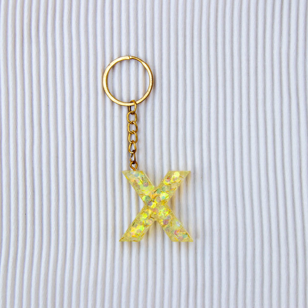 Porte-clés lettre X translucide paillettes