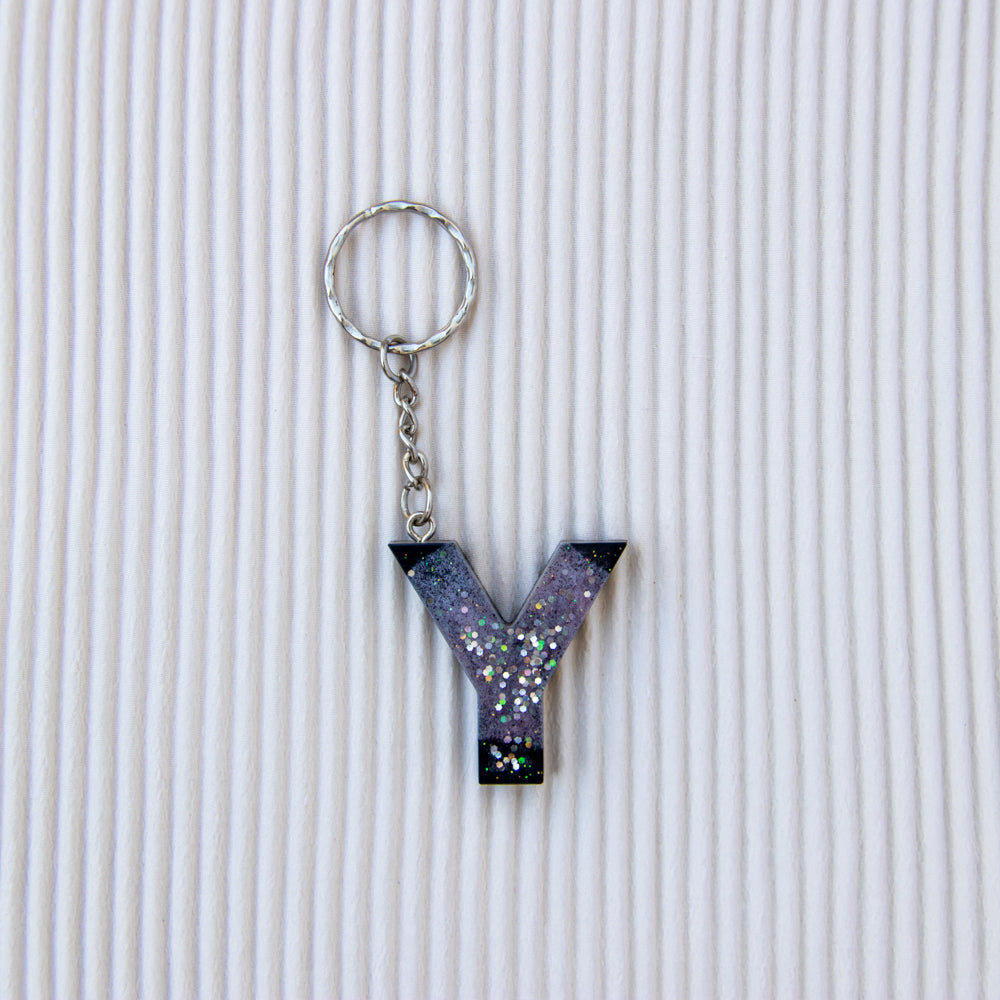 Porte-clés lettre Y noir mauve paillettes