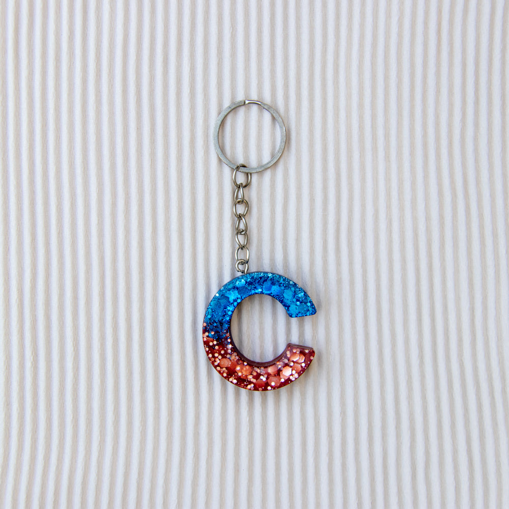 Porte-clés lettre C bleu marron paillettes