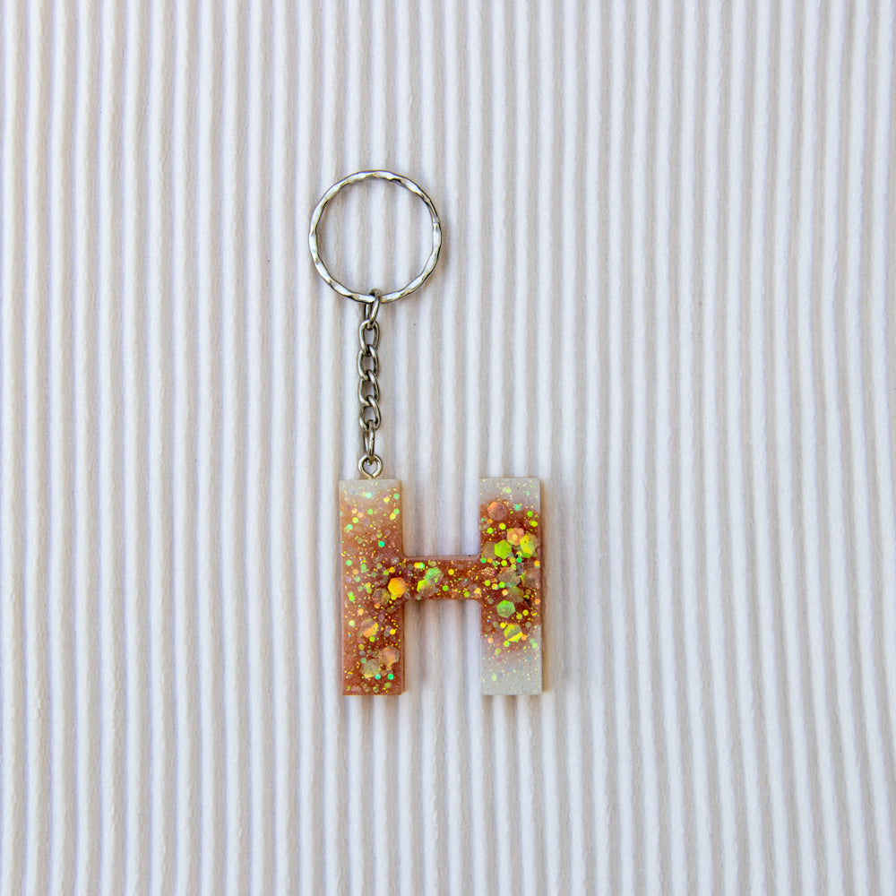 Porte-clés lettre H marron blanc paillettes