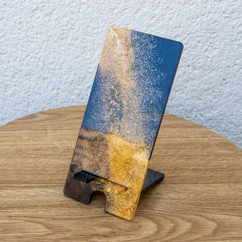 Support téléphone noir et or