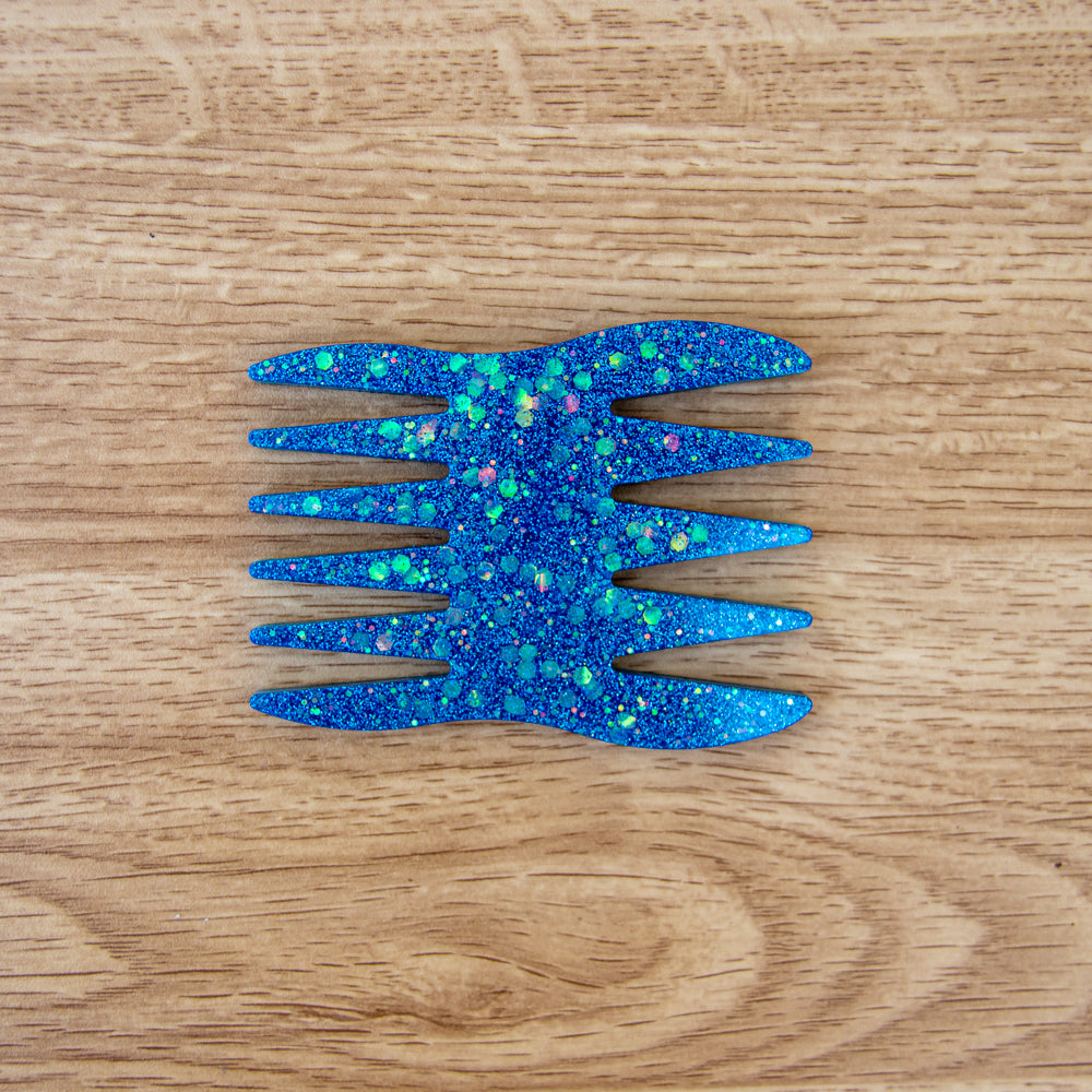 Peigne à cheveux grosses dents bleu paillettes