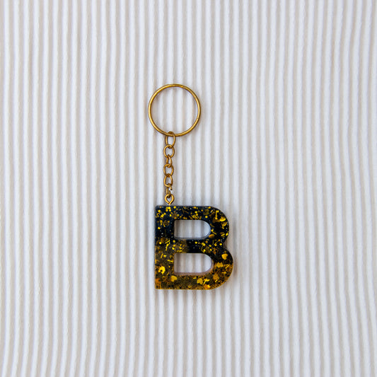 Porte-clés lettre B noir or à paillettes