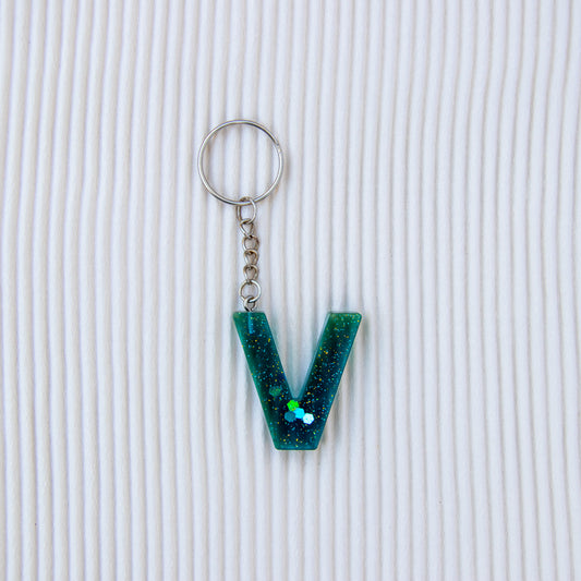 Porte-clés lettre V translucide bleu paillettes