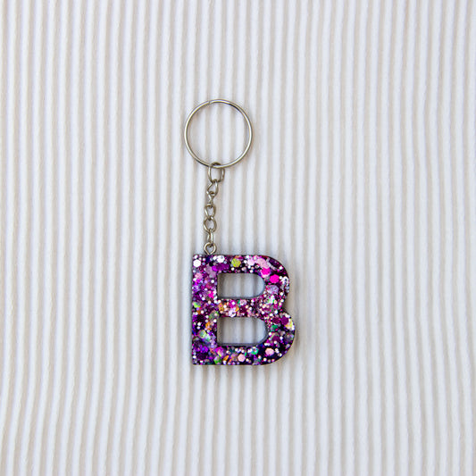 Porte-clés lettre B violet à paillettes