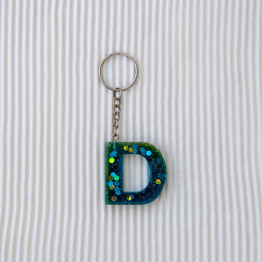 Porte-clés lettre D bleu transparent paillettes