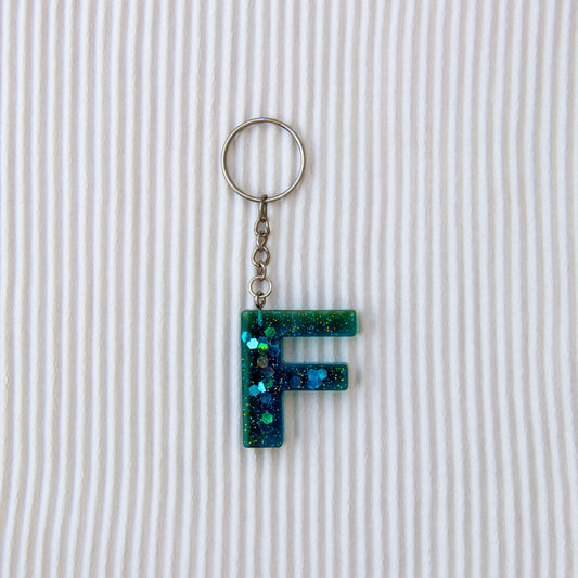 Porte-clés lettre F bleu vert transparent paillettes