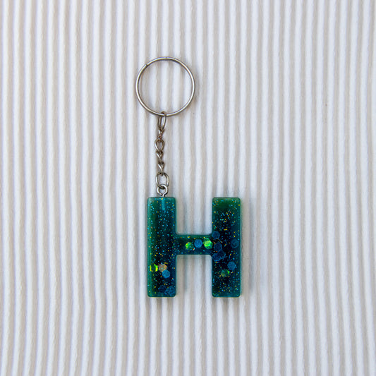 Porte-clés lettre H bleu transparent paillettes
