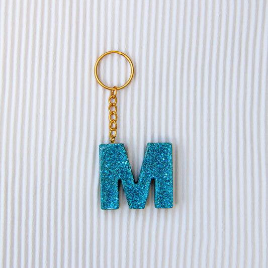 Porte-clés lettre M vert paillettes bleu